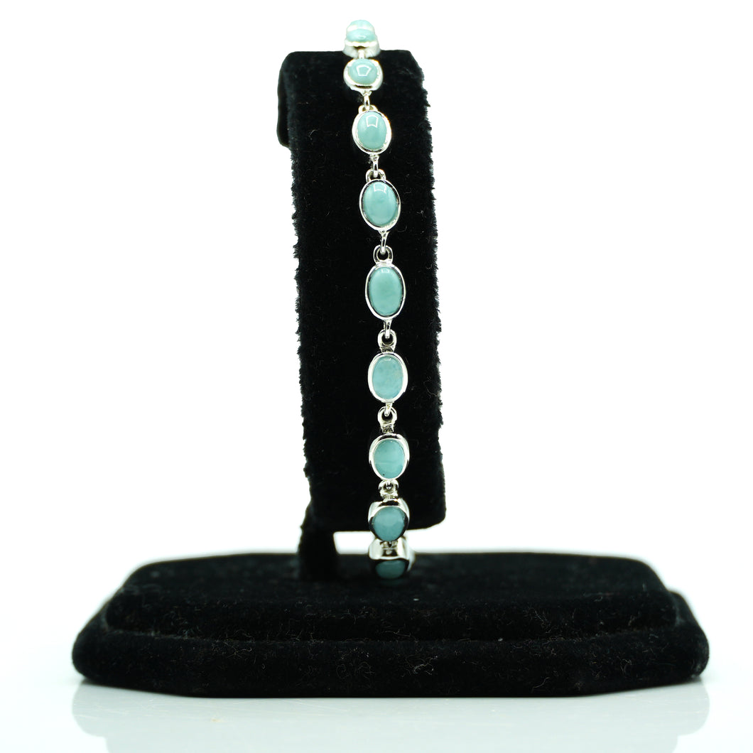 Larimar Silver Bracelet set with cabochon-cut gemstones in Prong Settings