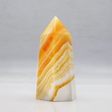 Load image into Gallery viewer, Banded Orange Calcite Towers
