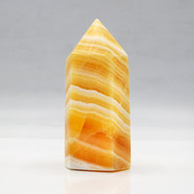 Load image into Gallery viewer, Banded Orange Calcite Towers
