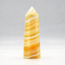 Load image into Gallery viewer, Banded Orange Calcite Towers
