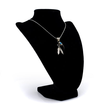 Zuni Bear Claw Pendant – Sterling Silver with Turquoise and Hanging Feathers