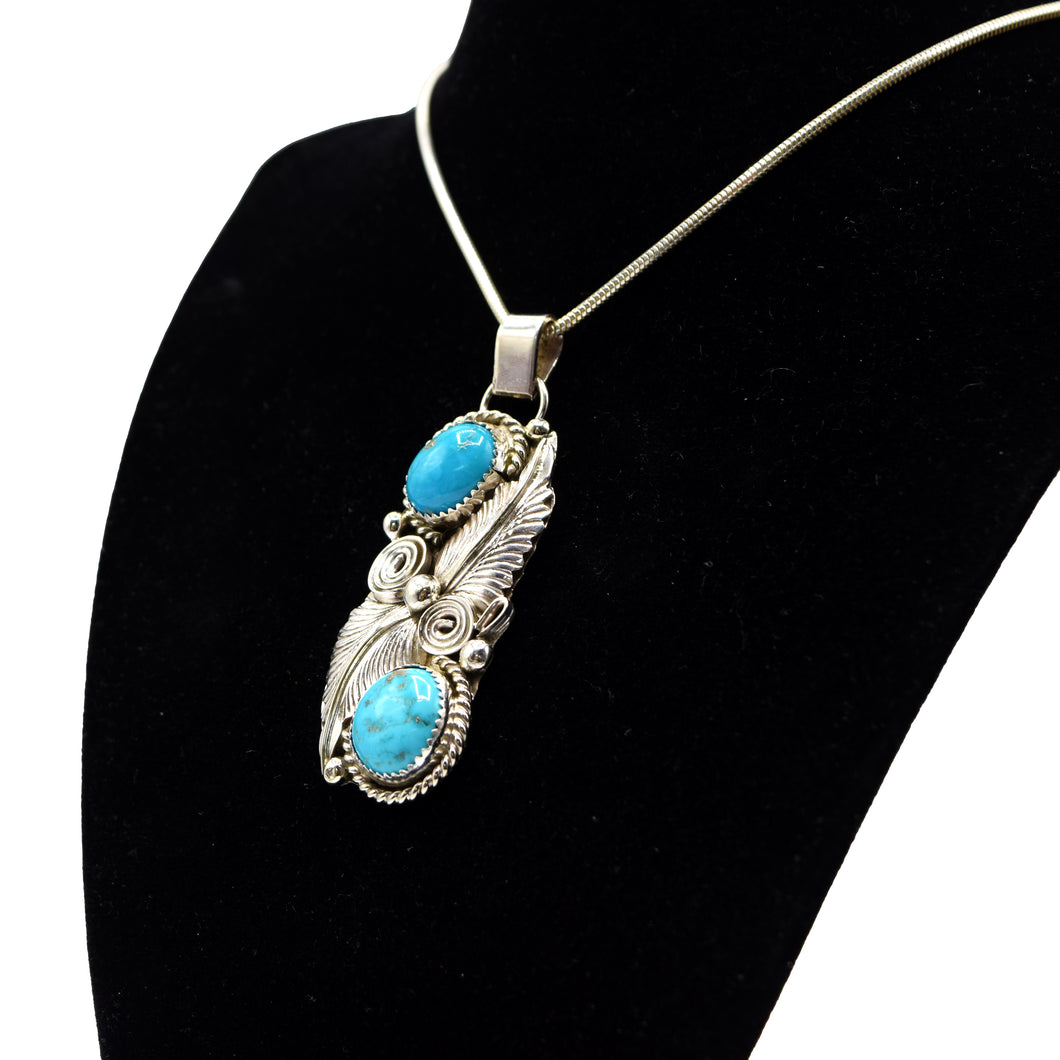 Zuni Turquoise Feather Pendant – Sterling Silver with Rope, Hammer & Stamp Work